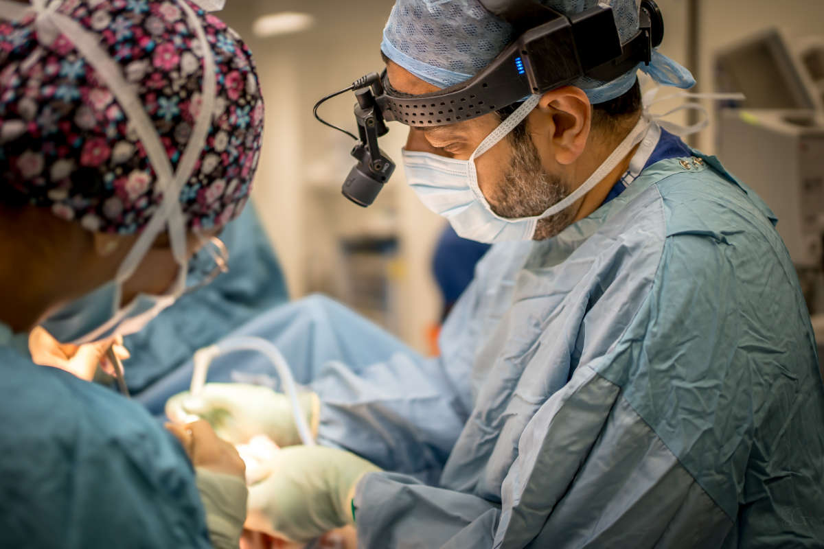 Mina and assistant in surgery Mina and assistant in surgery